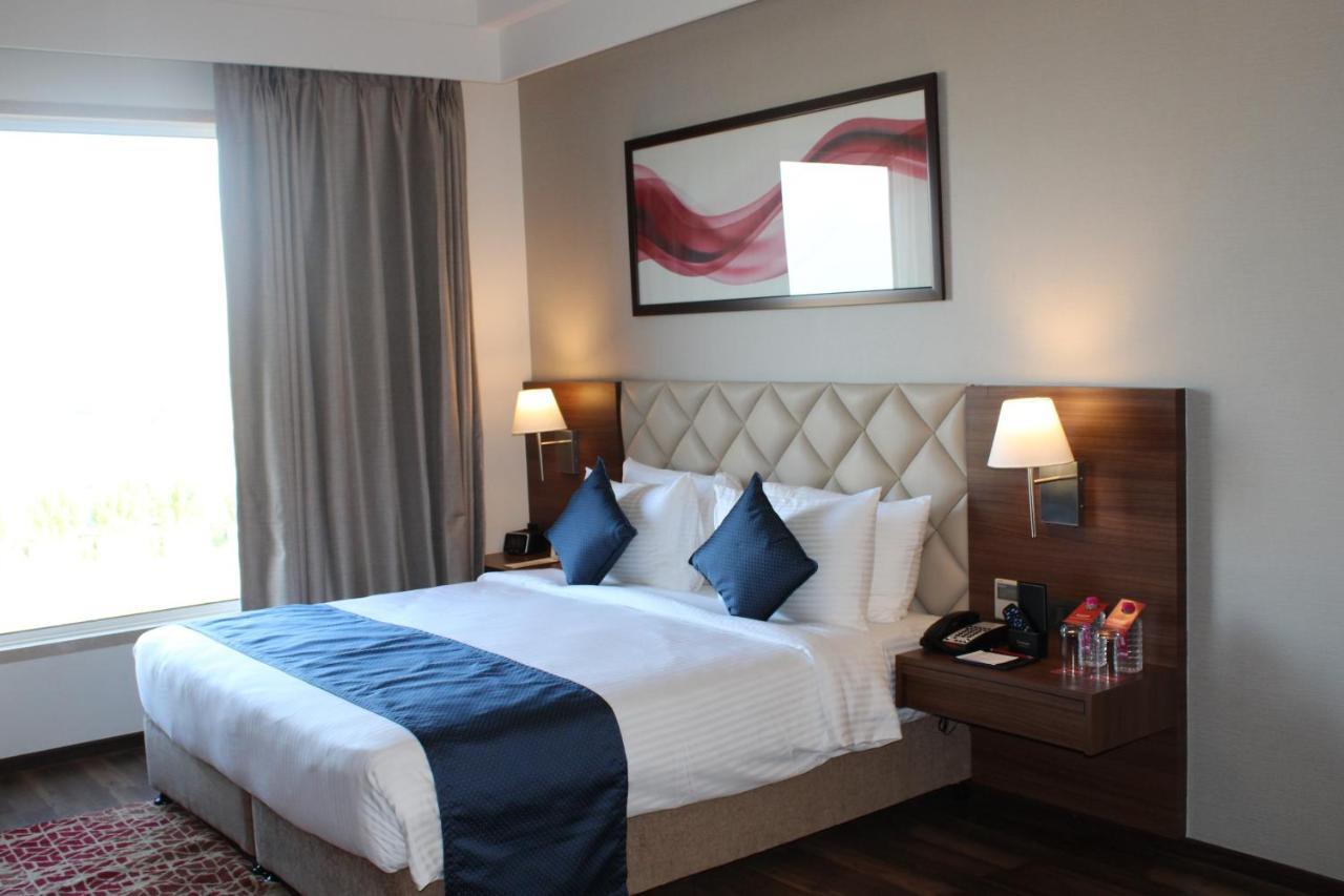 Отель Ramada By Wyndham Gandhidham Shinay Экстерьер фото