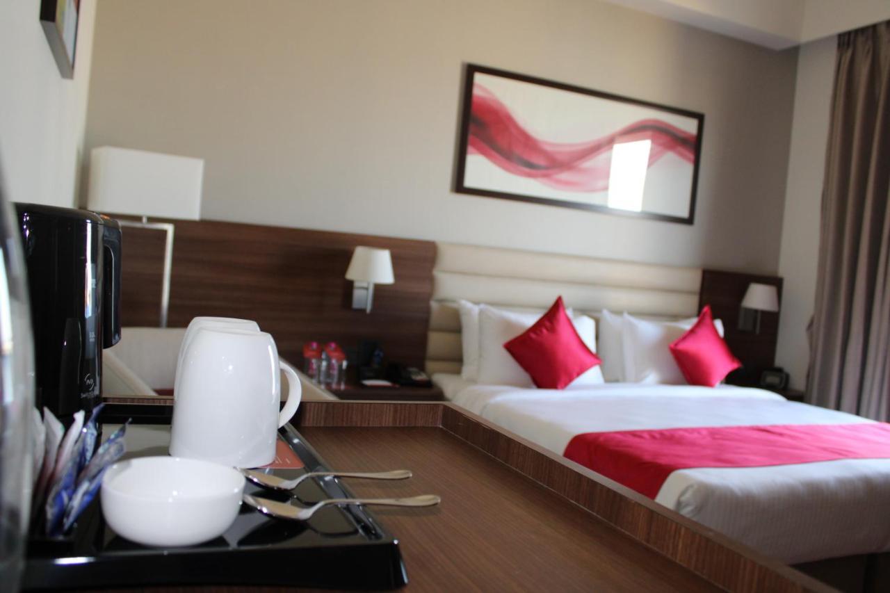Отель Ramada By Wyndham Gandhidham Shinay Экстерьер фото