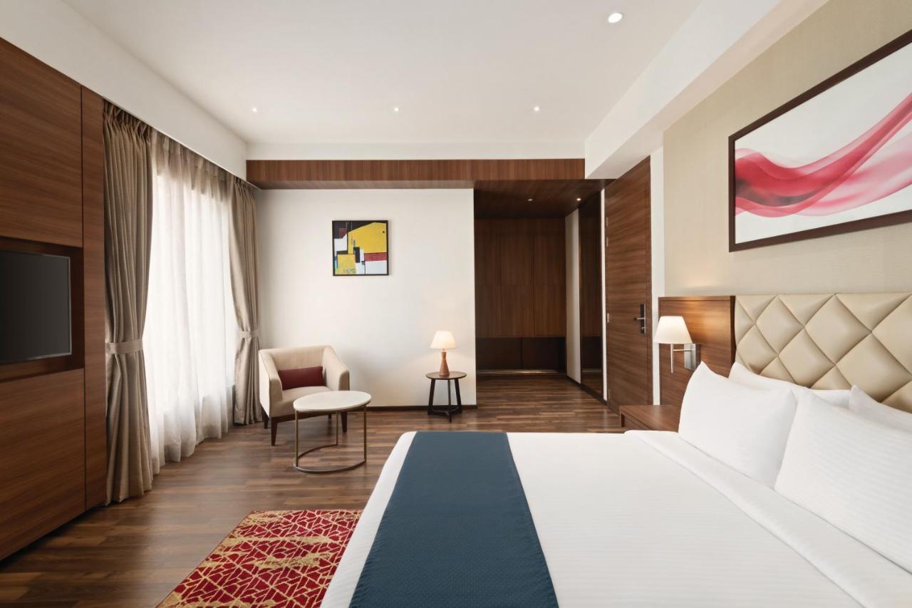 Отель Ramada By Wyndham Gandhidham Shinay Экстерьер фото